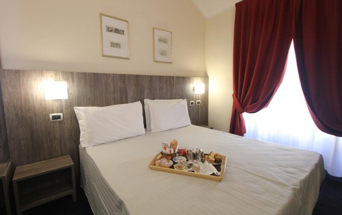 Slaapkamer in Hotel Urbani Turijn