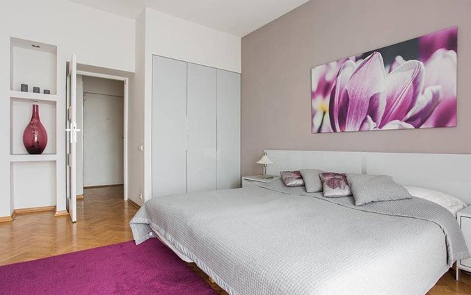 Slaapkamer van een appartement van Appartementen 4Seasons in Krakau