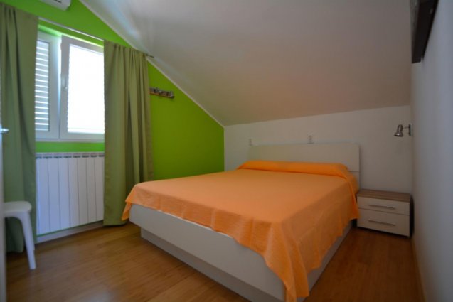 Slaapkamer van een appartement van appartementen Villa Rosa in Dubrovnik