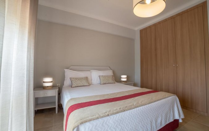 Slaapkamer van Aparthotel Flor Da Rocha in de Algarve