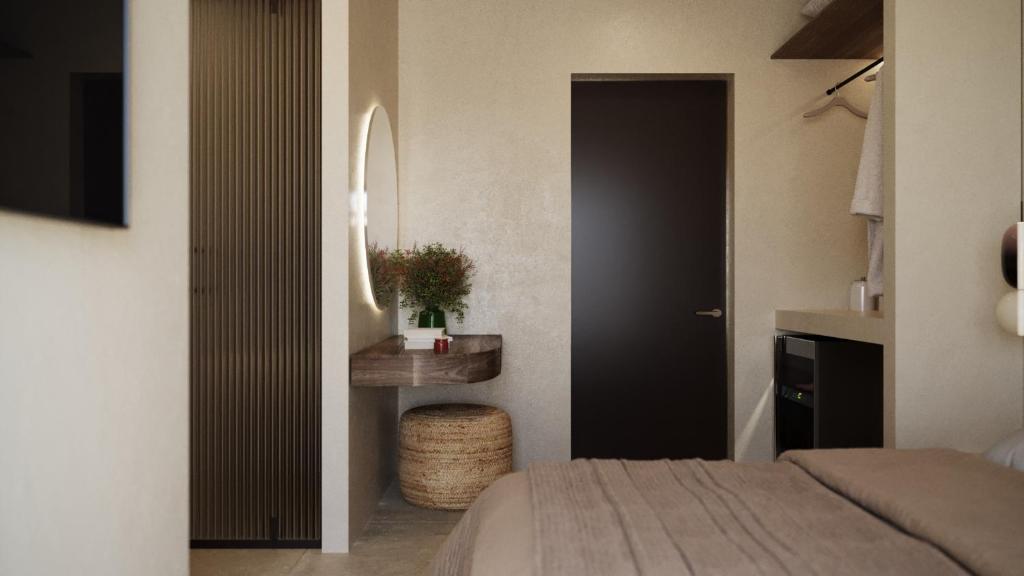 Momi Slow Living Hotel - slaapkamer met kaptafel