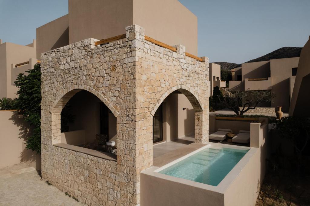 Momi Slow Living Hotel - suite met prive zwembad