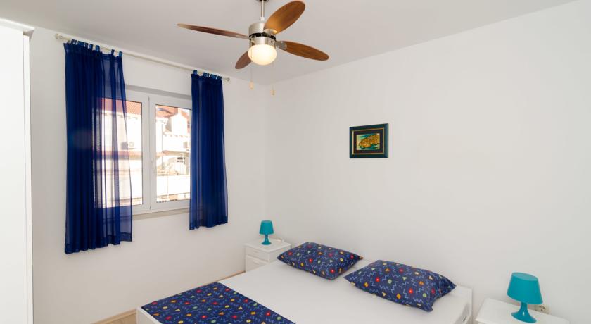 Slaapkamer van een appartement van Aparthotel Apartmani Vulicevic in Dubrovnik