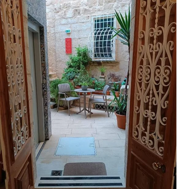 Palazzino Nina Boutique Hotel ingang 