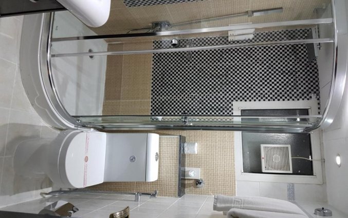 Badkamer in een kamer van Hotel Al Jawhara Metro in Dubai