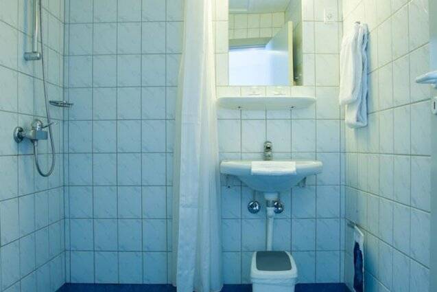 Badkamer van een tweepersoonskamer van hotel Maritime in Kopenhagen