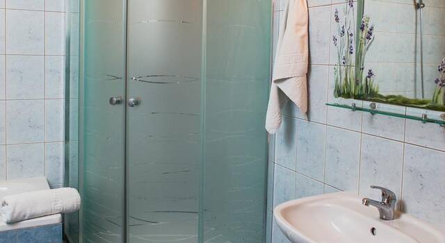 Badkamer van een tweepersoonskamer van Hotel Astoria in Krakau