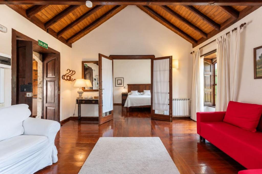 Hotel Rural Las Calas - suite met zithoek
