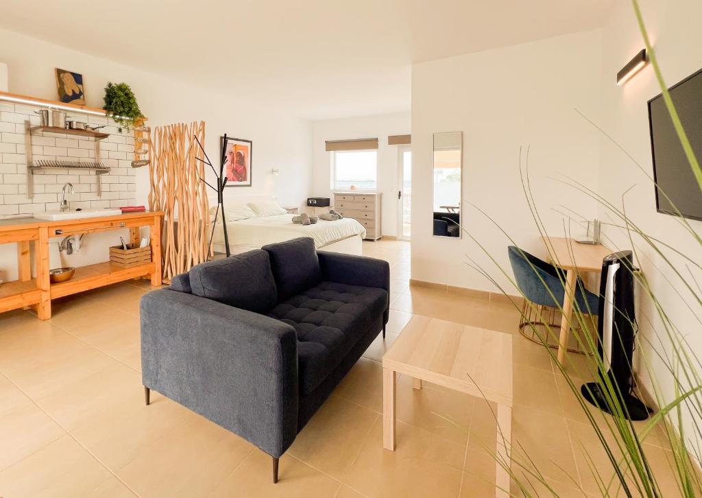 Helene Holidays - woonkamer van het appartement