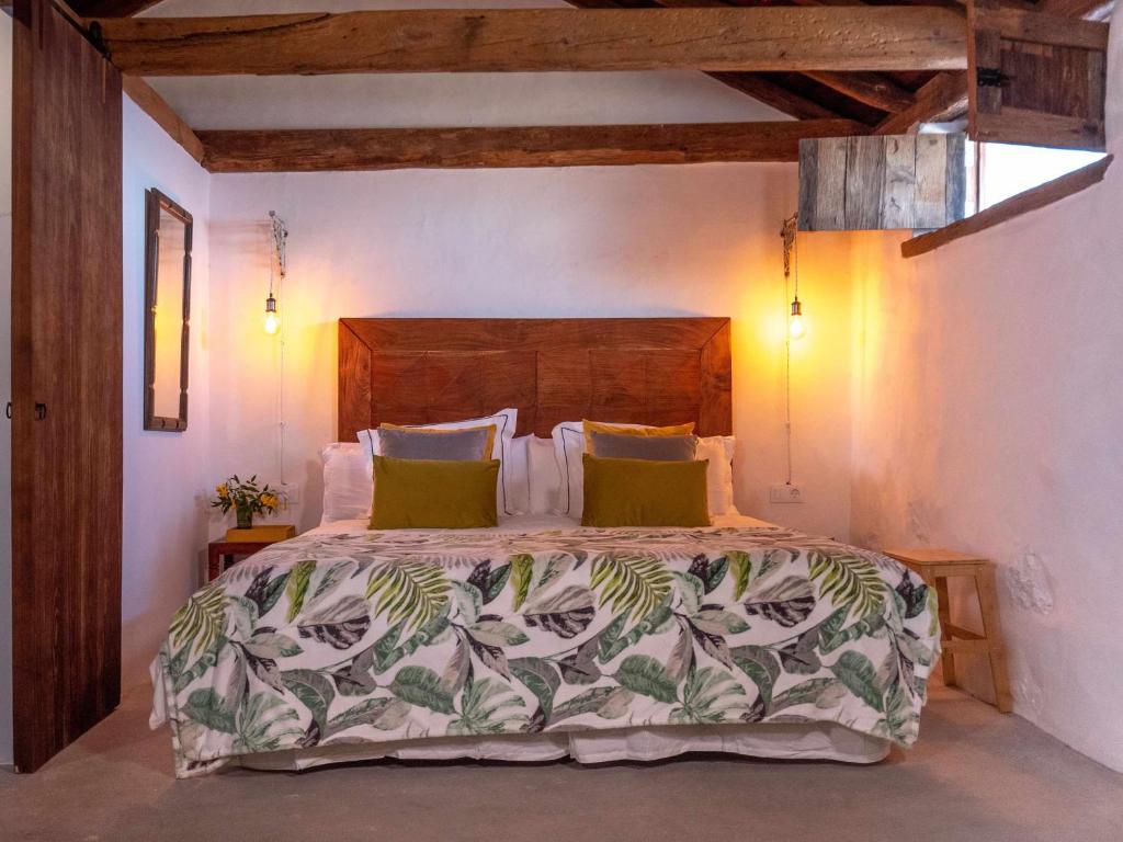 Hacienda El Terrero - slaapkamer met bloemenprint
