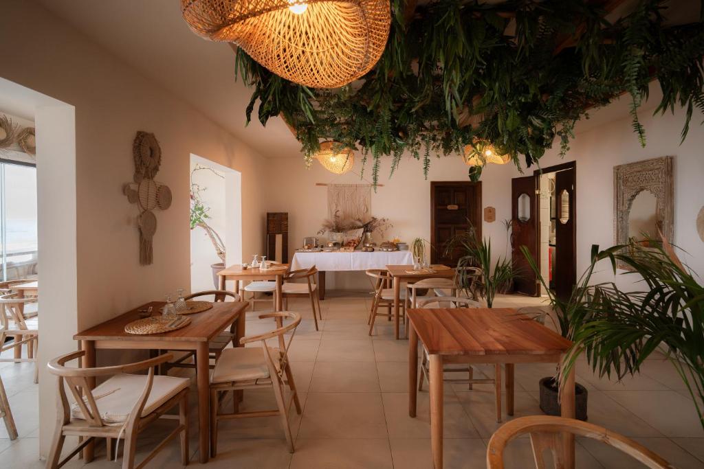 Boutique Eco Hotel Costa Magica - restaurant met plantendecor
