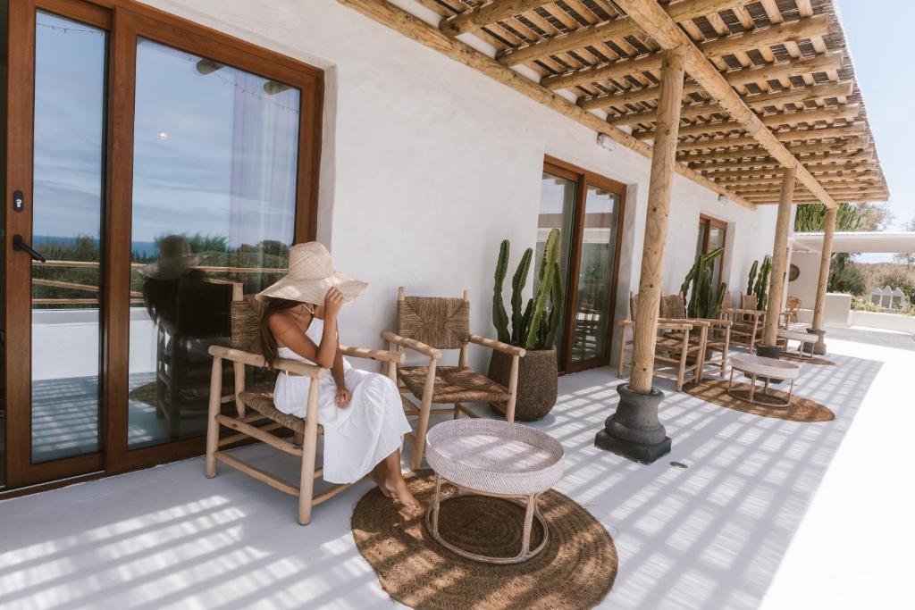 Boutique Eco Hotel Costa Magica - veranda met zithoek