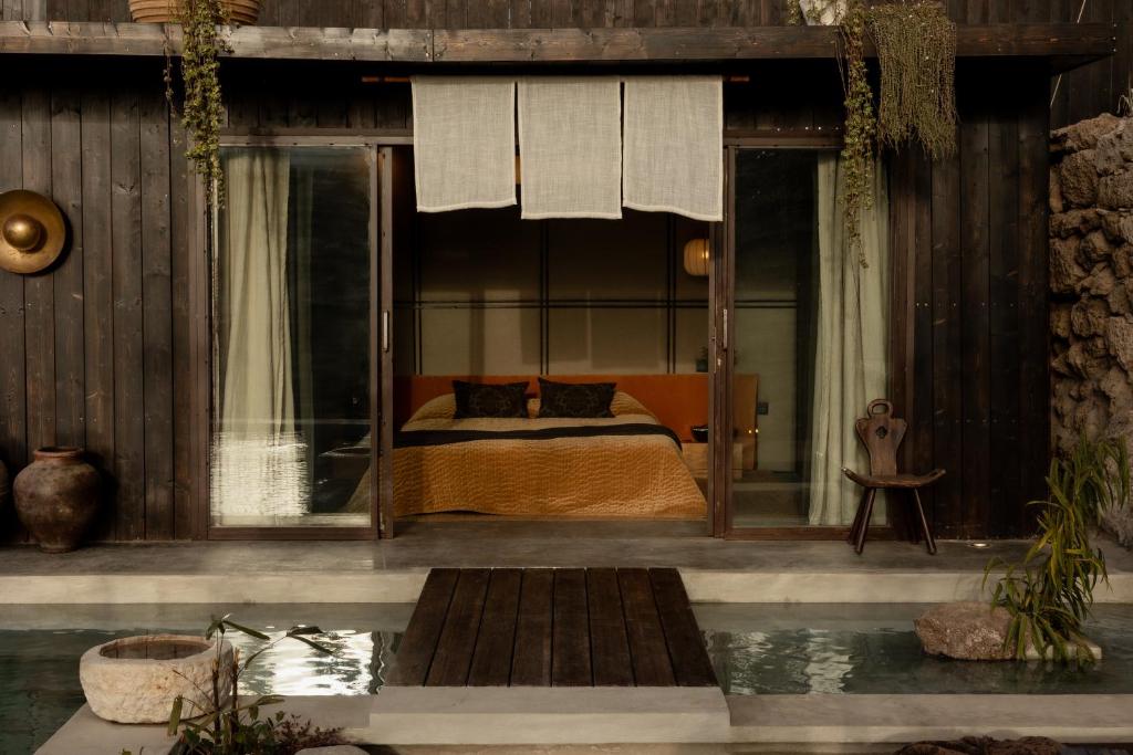 Ecohotel El Agua - kamer met eigen waterpartij