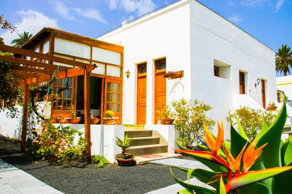 Casa Rural Villa Lola y Juan - gevel met pergola