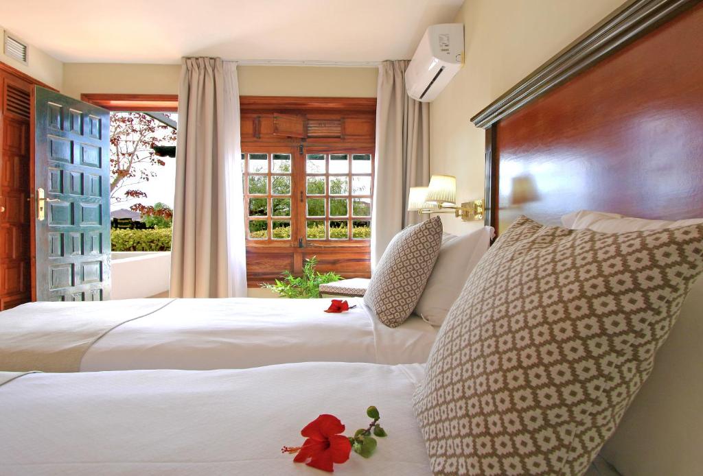 Hotel Rural Finca de La Florida - tweepersoonskamer met terrasdeuren