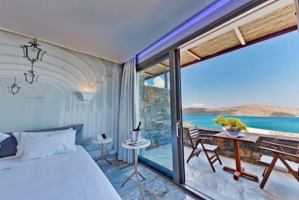 Royal Marmin Bay - kamer met terras aan zee