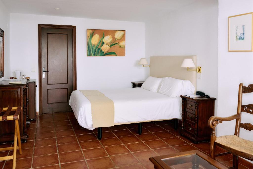 Molino del Santo - slaapkamer met tegelvloer