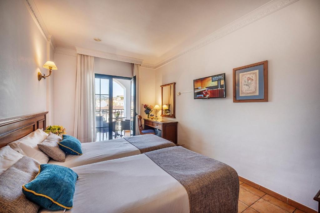 Beneste Frigiliana - kamer met balkondeuren