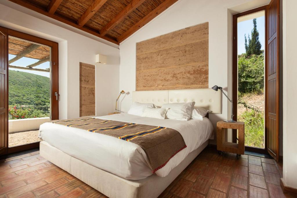 Monte da Vilarinha - slaapkamer met houten wand