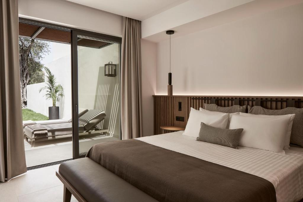 The Olivar Suites - slaapkamer met terrasdeuren