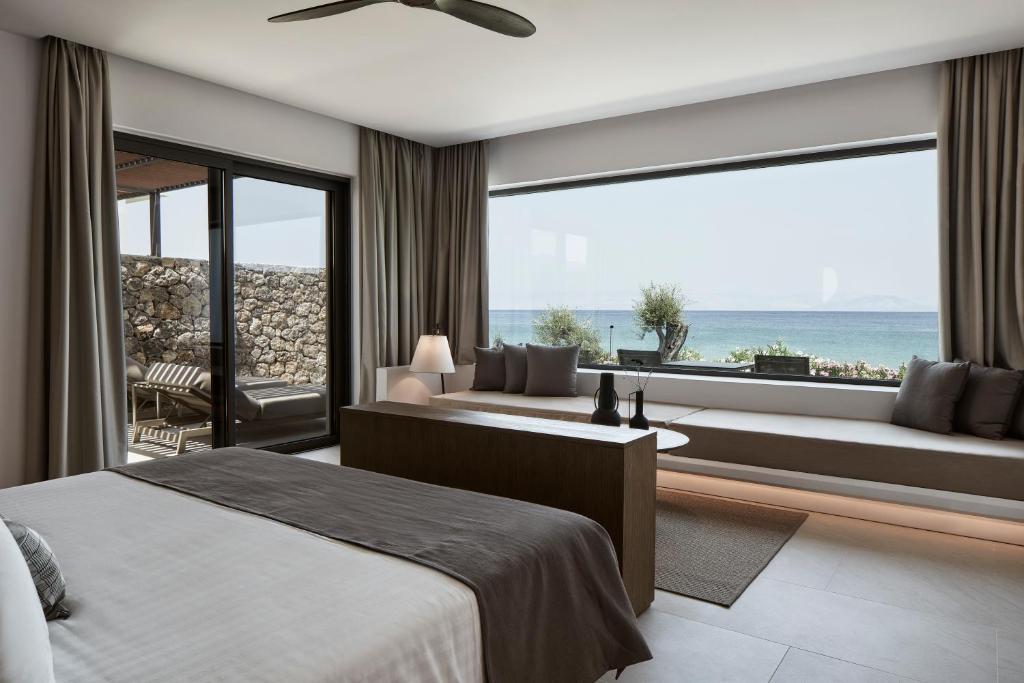 The Olivar Suites - slaapkamer met zeezicht