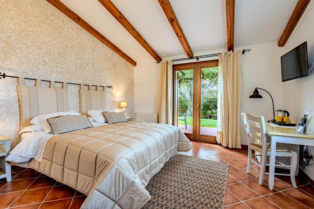 Tenuta Pilastru - kamer met terrasdeuren naar de tuin