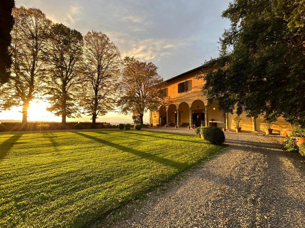 Villa Il Poggiale - de villa bij zonsondergang