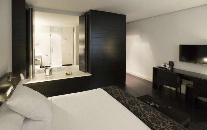 Slaapkamer van hotel Hospes Palau de La Mar in Valencia