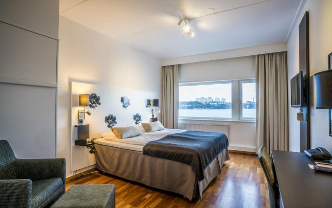 Slaapkamer met tweepersoonsbed van Hotel Scandic Ariadne in Stockholm
