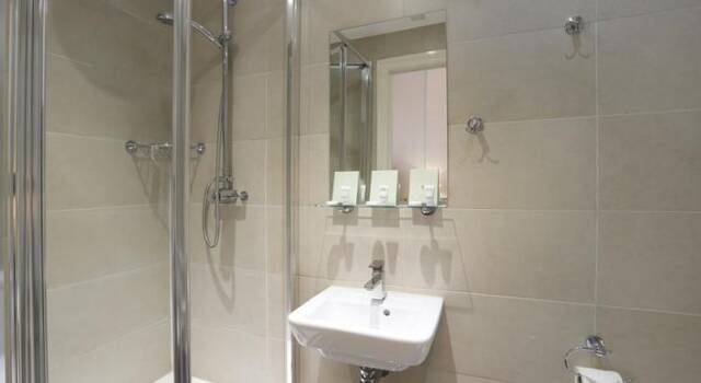 Badkamer van een tweepersoonskamer van Hotel Hyde Park Boutique in Londen