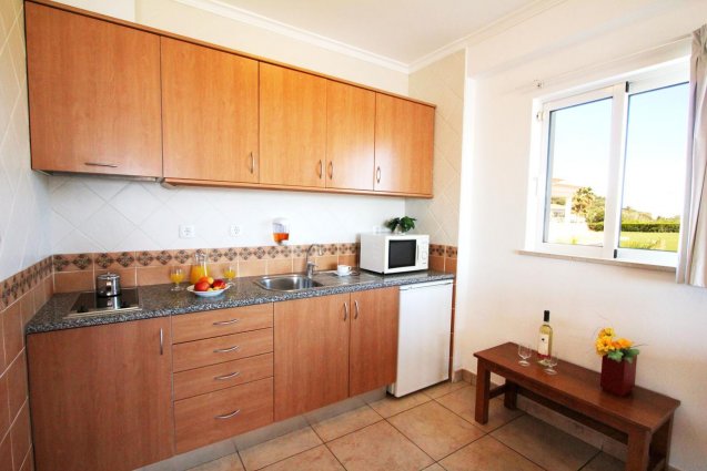 Een keuken van een appartement van Hotel Clube Mos Algarve
