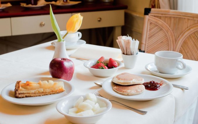 Tafel met ontbijt van Hotel iH Milano Regency Milaan Italië