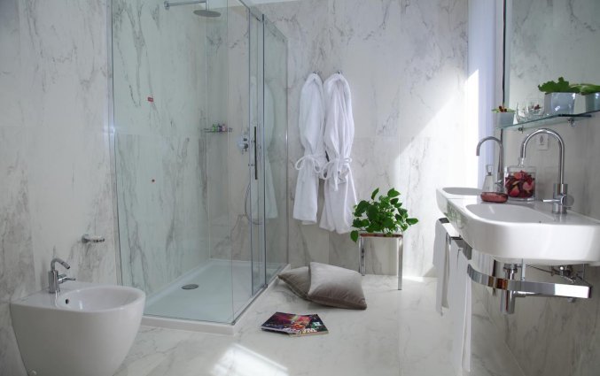 Een badkamer van Hotel Sanpi Milaan