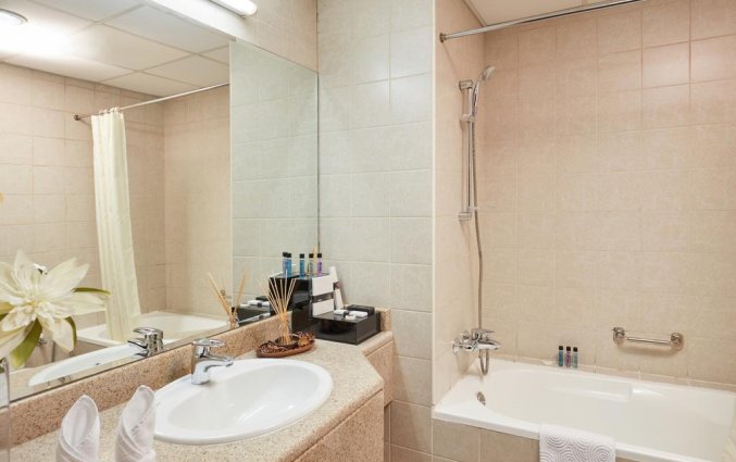 Badkamer van een appartement van Appartementen ZiQoo in Dubai