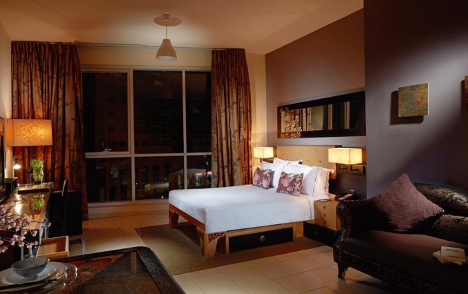 Slaapkamer van een appartement van Appartementen ZiQoo in Dubai