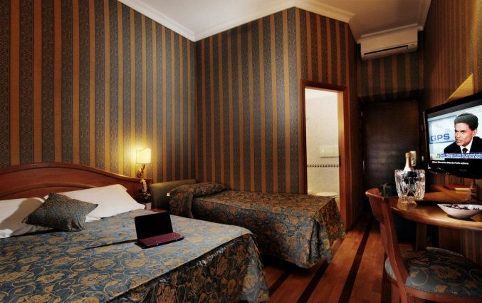 Slaapkamer van hotel Solis in Rome